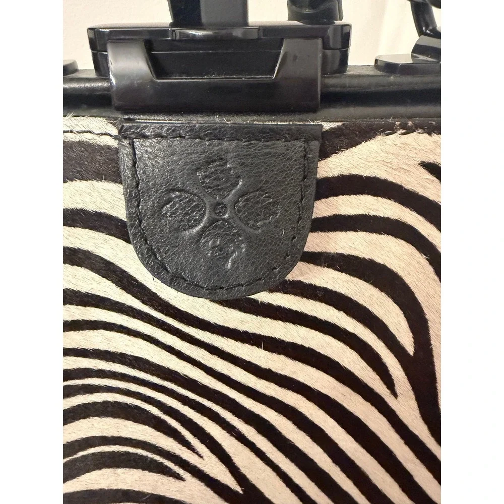 1 Patricia Nash Zebra-print Haircalf and Black Leather Frame Satchel Bag